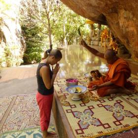 Монаху нужно рассказать (через переводчика) с какой целью ты сюда пришел, после этого он благословляет тебя ,читая мантры и окропляя водой. - Камбоджа, январь 2012г.